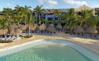 How far is Iberostar Paraiso Maya from Cancun Airport