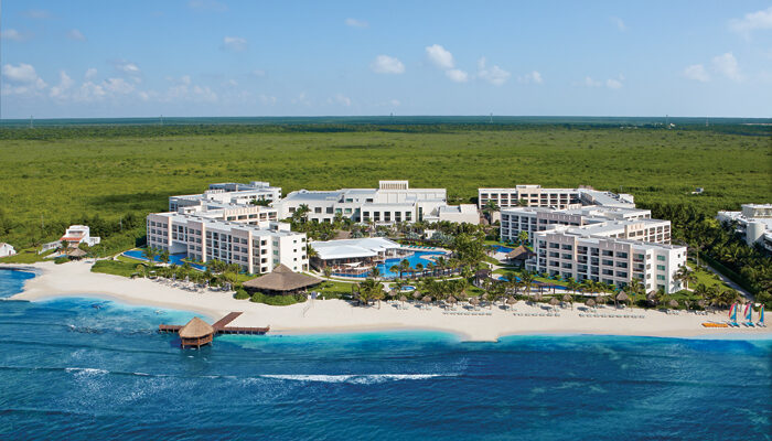 How far is Secrets Silversands from Cancun Airport
