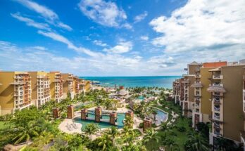 How far is Villa del Palmar from Downtown Cancun