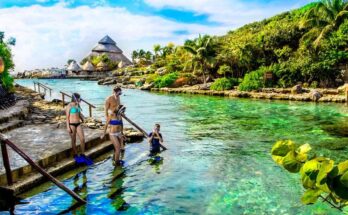 How far is Xcaret from Cancun